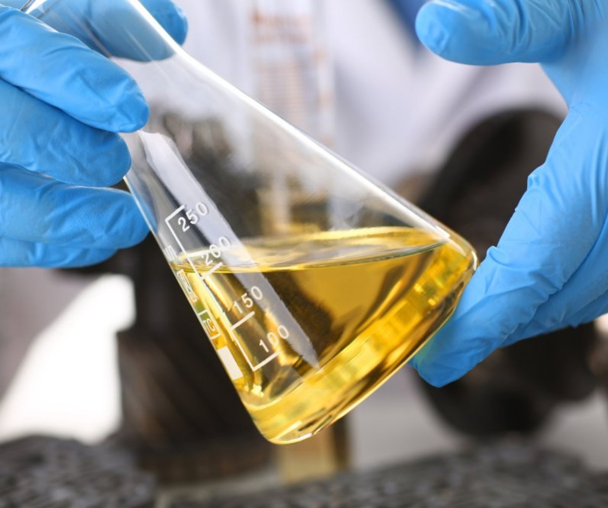 beaker full of yellow liquid